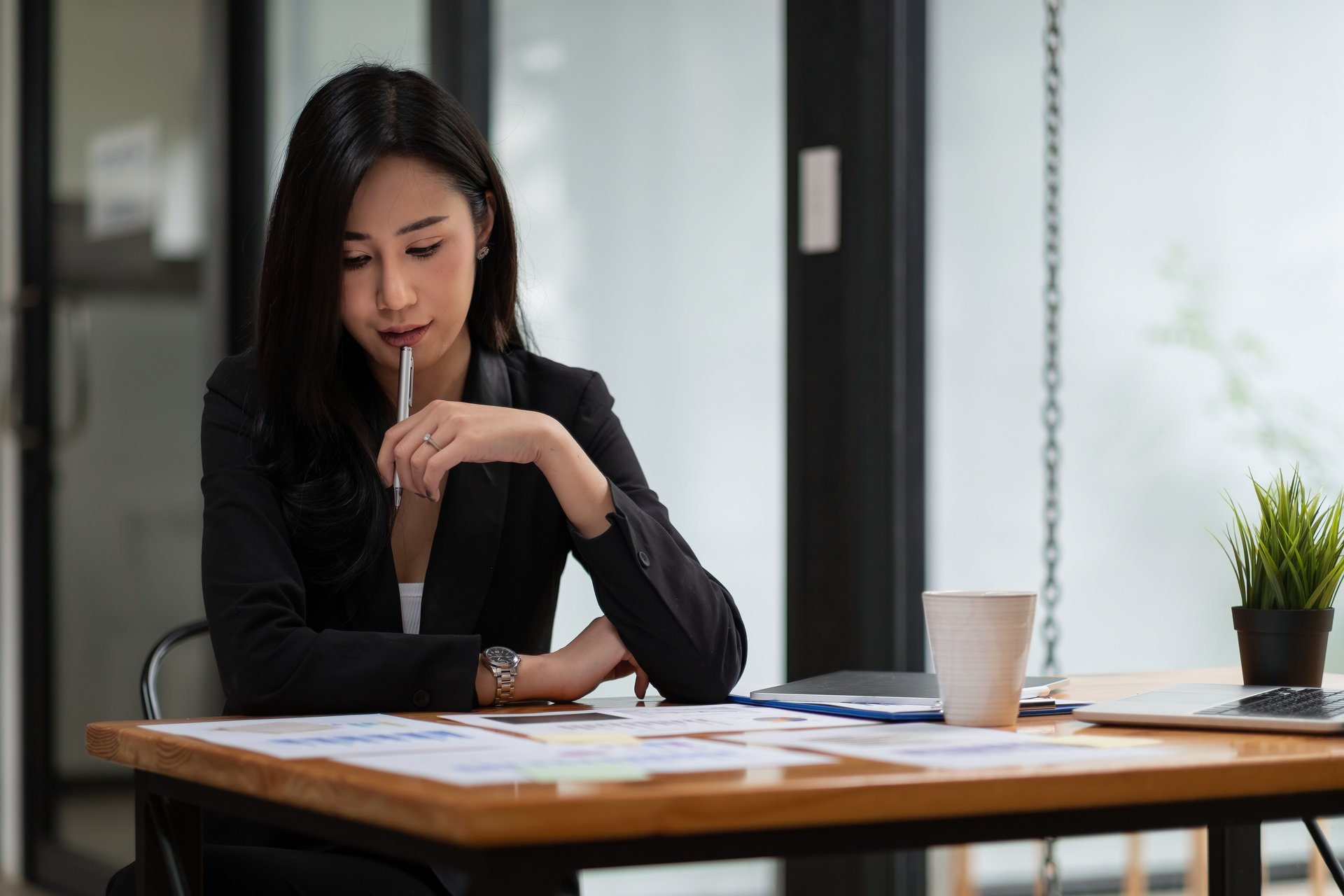 Portrait of Attractive Asian Businesswoman Working for Marketing Plan. Business Analysis,Financial Services,Financial Planning,